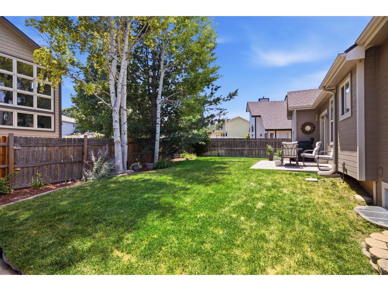 5116 West 6th Street Road Greeley, CO 80634 - Photo 41 of 44 Beautiful Backyard with Mature Trees for Added Privacy