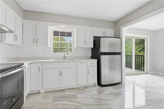 $305,000 | 1416 Southwest 3rd Street, Lee's Summit, MO 64081