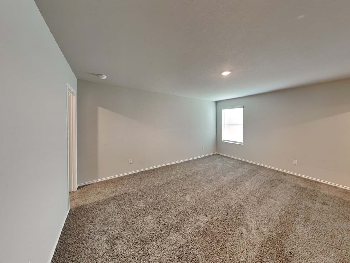 14927 Watson Mill San Antonio, TX 78254 - Photo 8 of 16 an empty room with windows and closet
