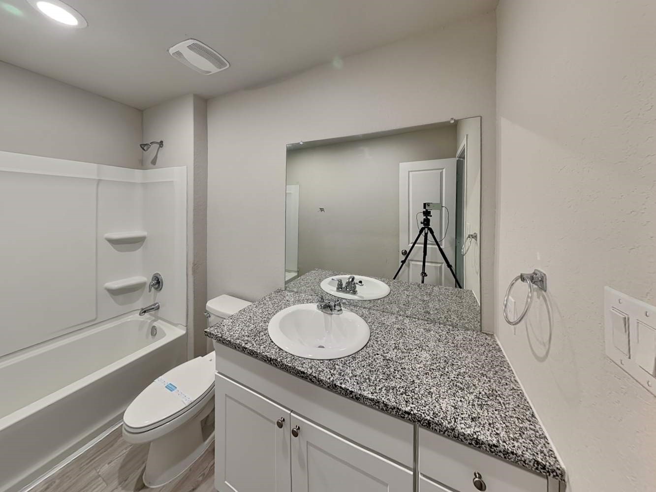 14927 Watson Mill San Antonio, TX 78254 - Photo 10 of 16 a bathroom with a granite countertop sink toilet and shower