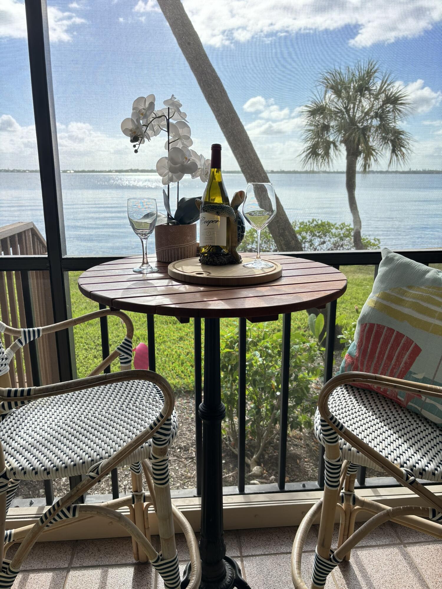 a view of a balcony with chairs