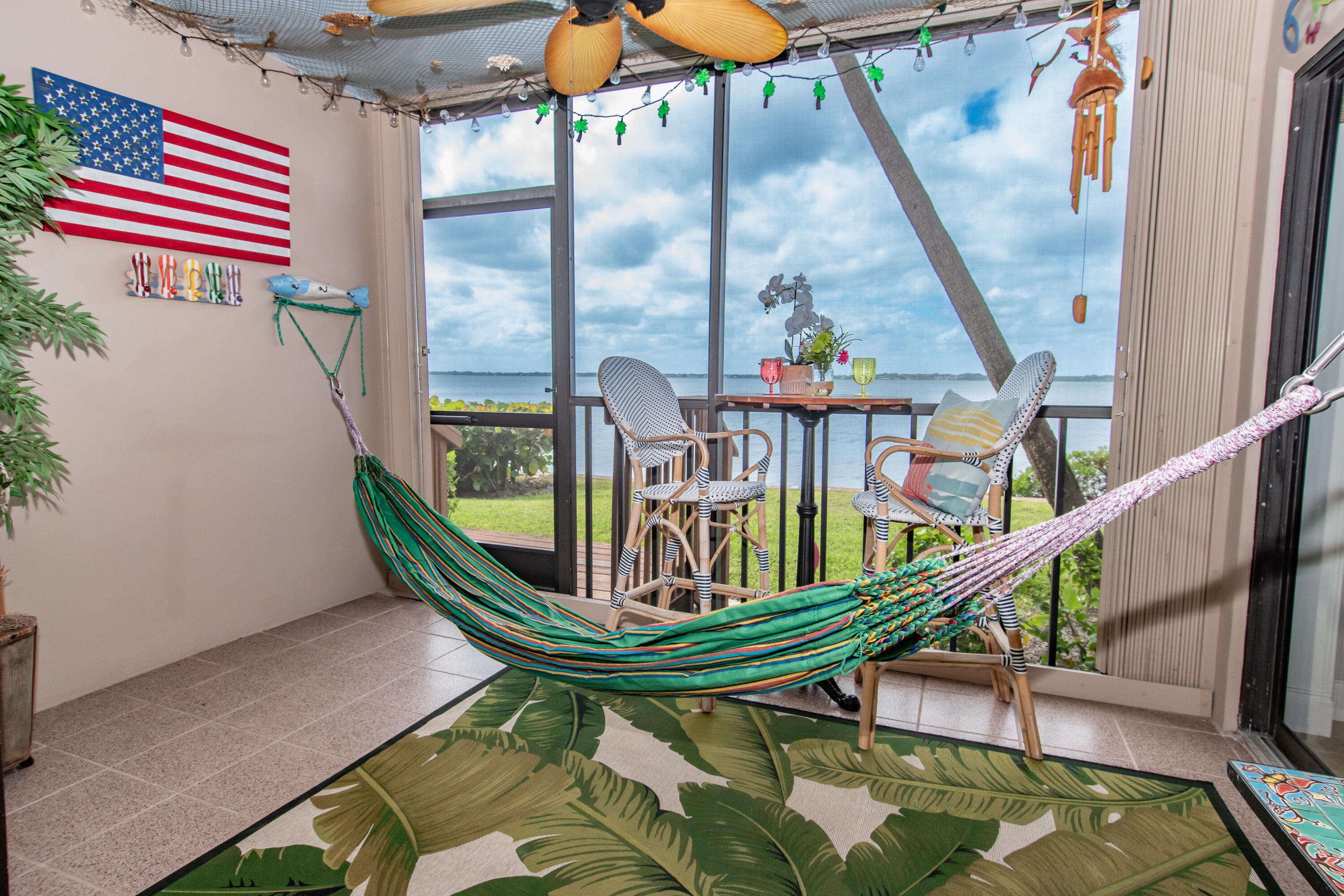 4440 Northeast Sandpebble Trace, Unit 104 Stuart, FL 34996 - Photo 5 of 33 a view of balcony with furniture