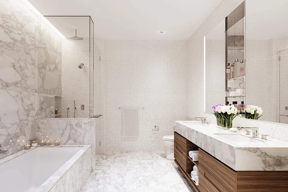 30 Riverside Boulevard, Unit 23P Manhattan, NY 10069 - Photo 6 of 29 a bathroom with a tub sink and mirror