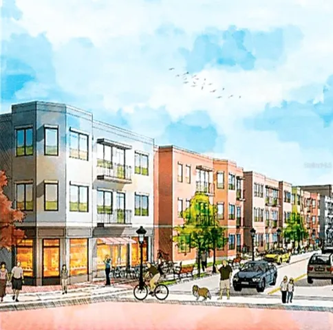 a city street lined with tall buildings