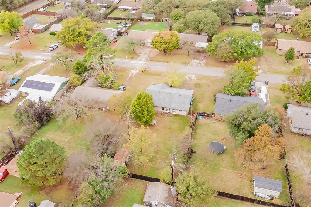 245 Gordon Drive Azle, TX 76020 - Photo 32 of 38 an aerial view of residential houses with swimming pool