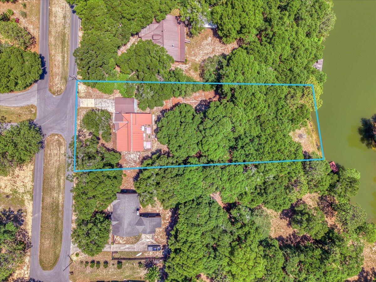 210 Shell Drive Crestview, FL 32536 - Photo 3 of 67 an aerial view of residential house with outdoor space and trees all around