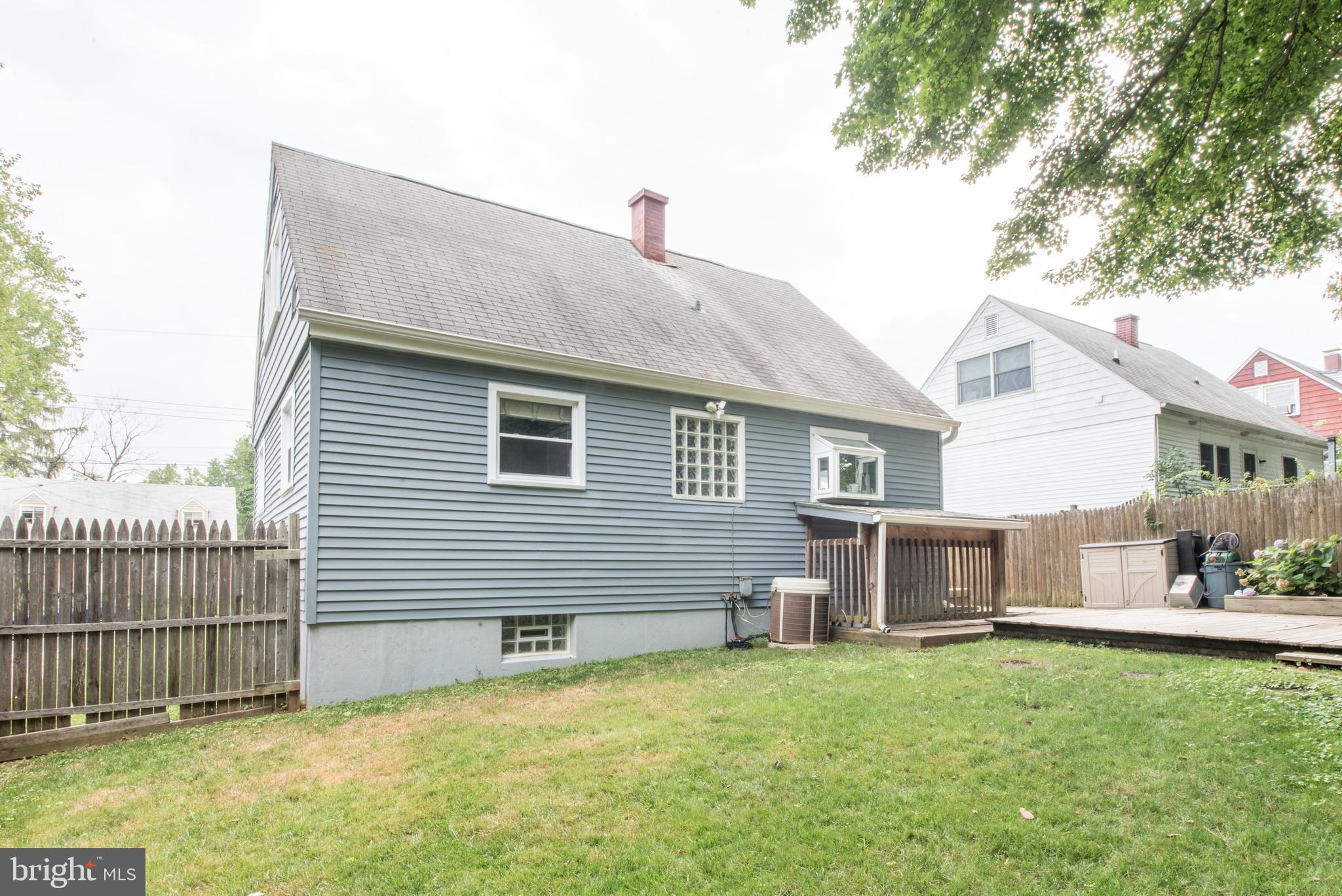 1346 Sudvale Road Baltimore, MD 21208 - Photo 29 of 30 a backyard of a house with table and chairs