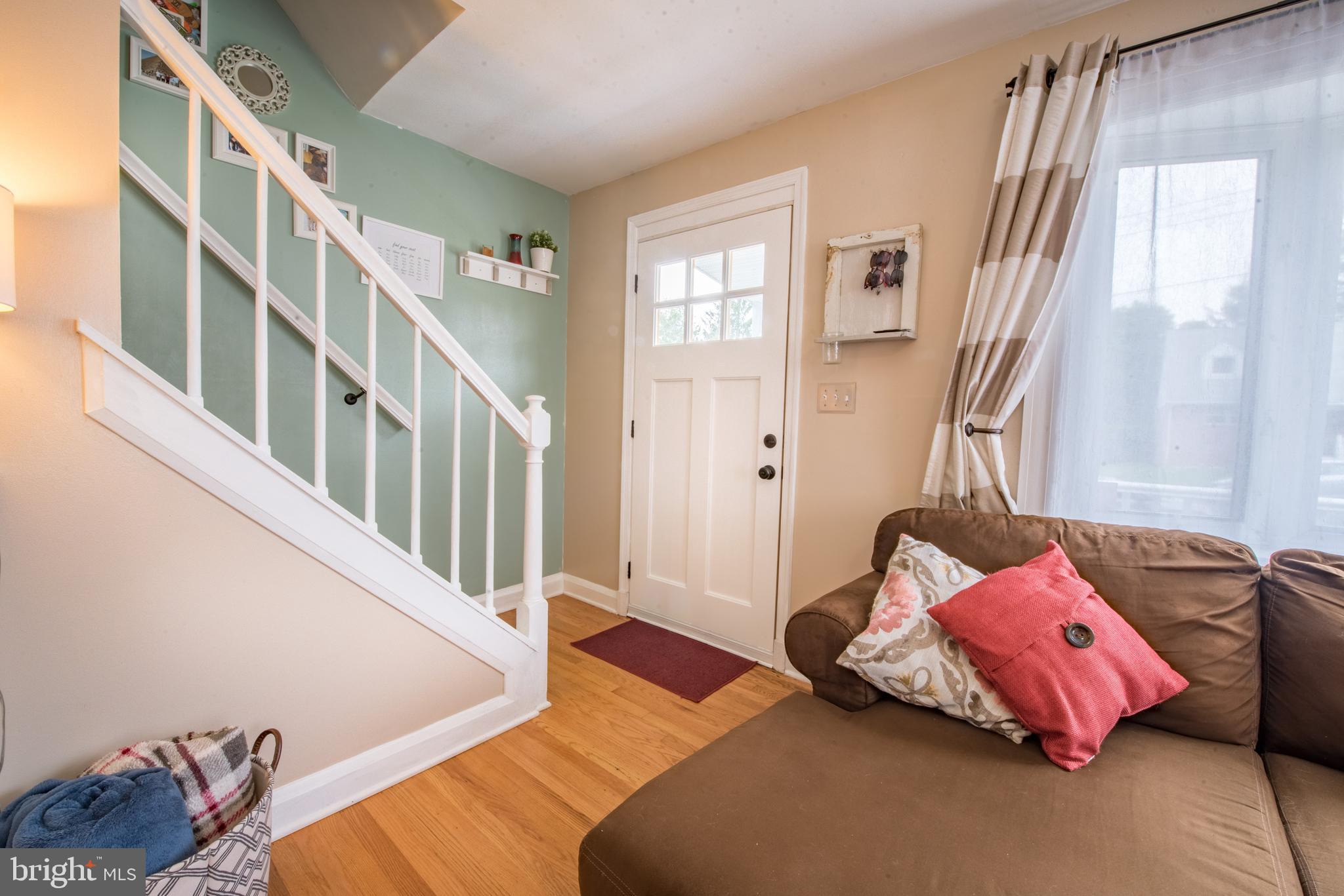 1346 Sudvale Road Baltimore, MD 21208 - Photo 6 of 30 a bedroom with furniture and a window