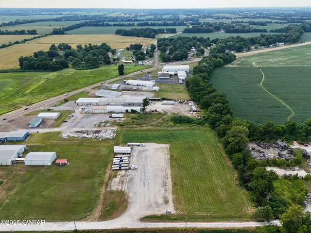 an aerial view of a golf course with a big yard