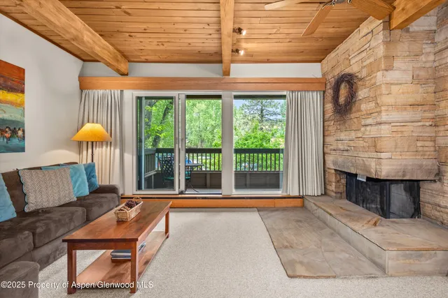 a room with furniture and a window