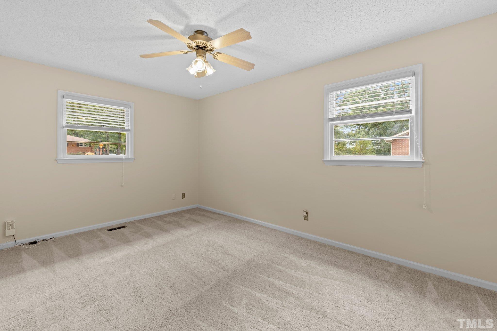 5101 Raintree Road Durham, NC 27712 - Photo 14 of 30 a view of an empty room with a window