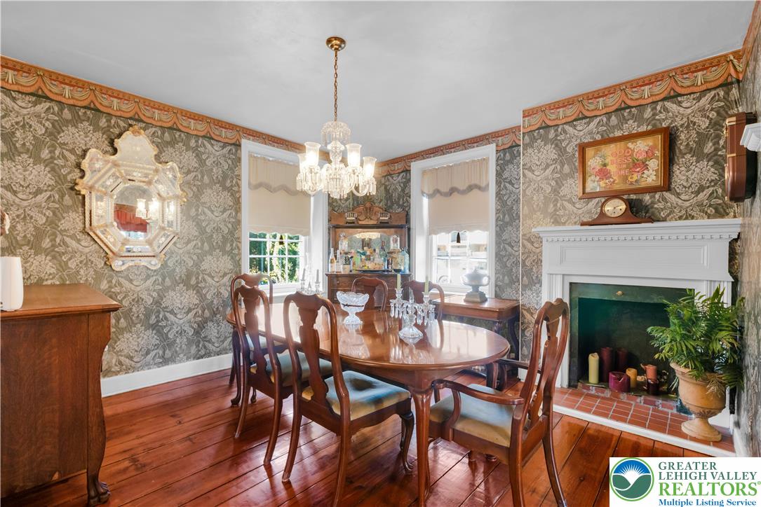 1742 Butztown Road Bethlehem, PA 18017 - Photo 34 of 56 Inviting dining room highlighted by a charming fireplace and conveniently situated just off the kitchen