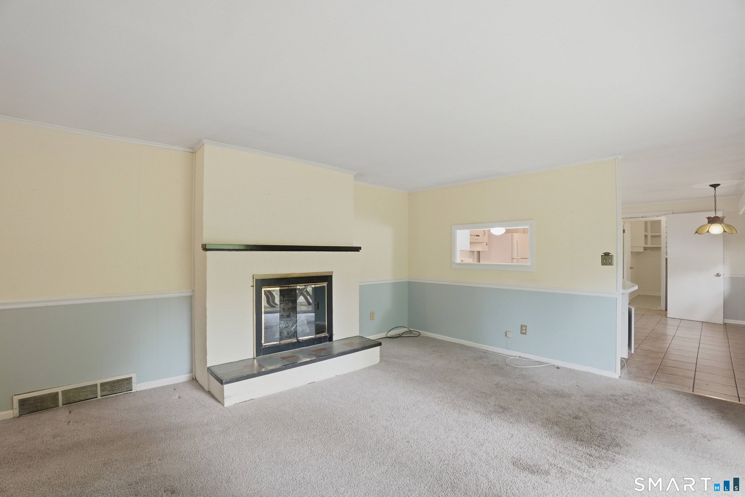 731 Still Hill Road Hamden, CT 06518 - Photo 29 of 40 an empty room with fireplace and windows