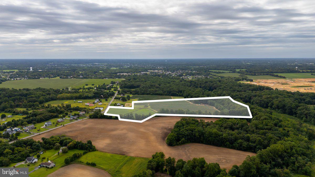 71 West Tomlin Station Road Mickleton, NJ 08056 - Photo 9 of 12 a view of a lake with a yard