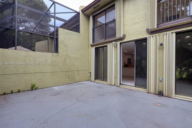a view of a house with a street
