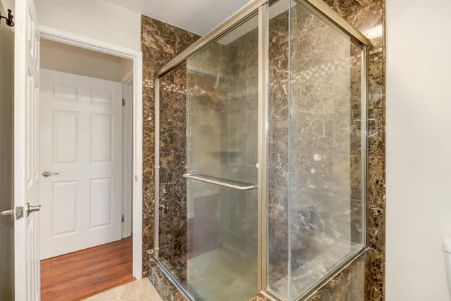 a view of an outside dining space with furniture