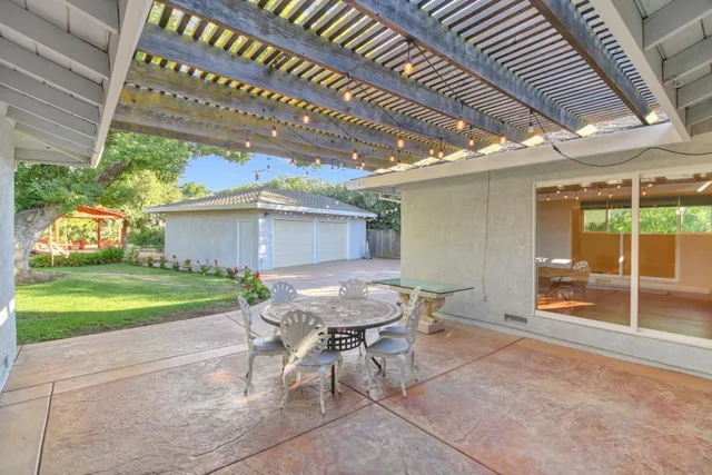 a backyard of a house with lots of green space