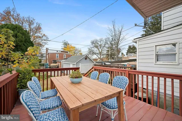 a view of a balcony with furniture