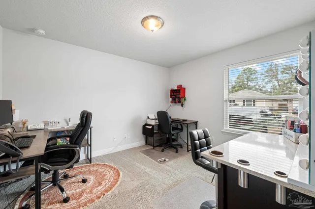 a room with furniture and window