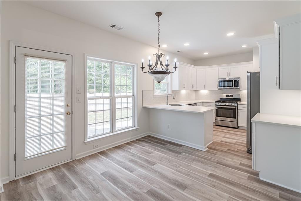 1324 Crescentwood Lane Decatur, GA 30032 - Photo 18 of 58 a view of a kitchen with microwave and cabinets