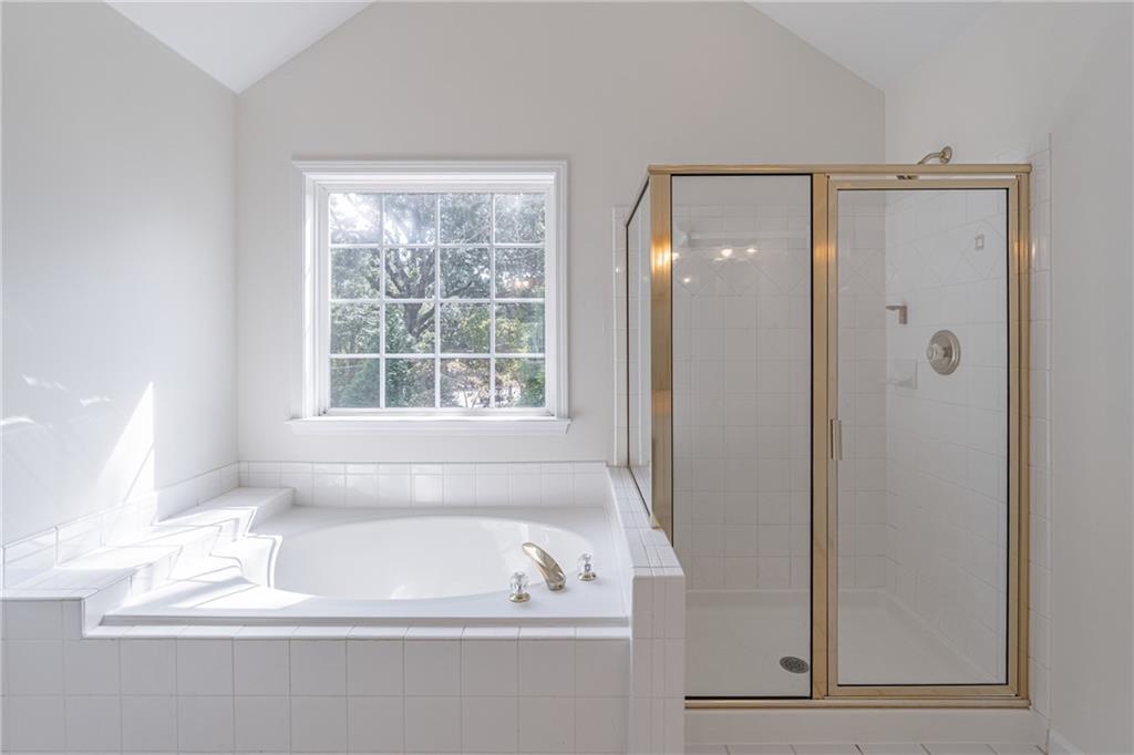 1324 Crescentwood Lane Decatur, GA 30032 - Photo 33 of 58 a bathroom with a bathtub and a window