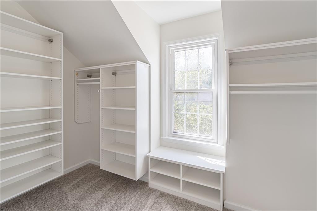 1324 Crescentwood Lane Decatur, GA 30032 - Photo 36 of 58 a view of walk in closet with empty racks