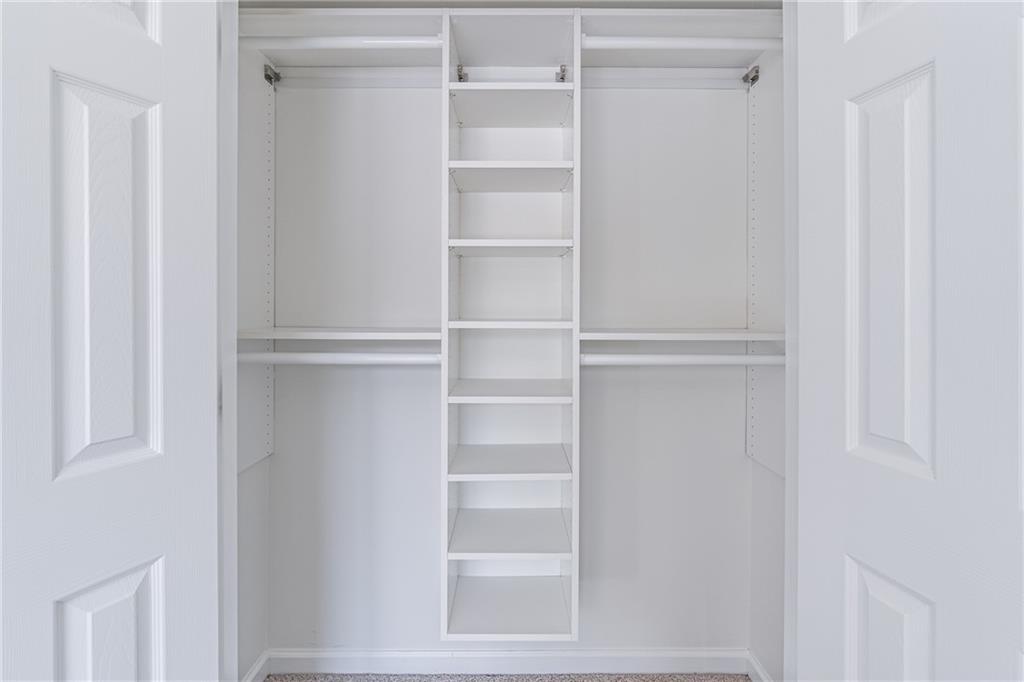 1324 Crescentwood Lane Decatur, GA 30032 - Photo 37 of 58 a view of walk in closet with empty racks