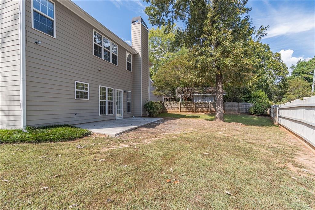 1324 Crescentwood Lane Decatur, GA 30032 - Photo 53 of 58 a backyard of a house with yard and outdoor seating
