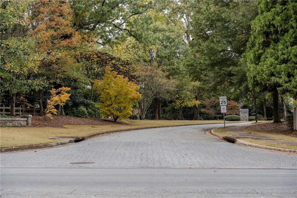 1324 Crescentwood Lane Decatur, GA 30032 - Photo 58 of 58 a backyard of apartments with large trees
