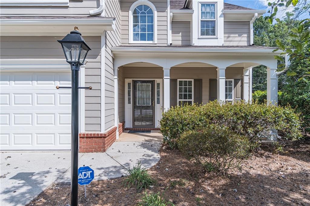 1324 Crescentwood Lane Decatur, GA 30032 - Photo 8 of 58 a front view of a house with garden