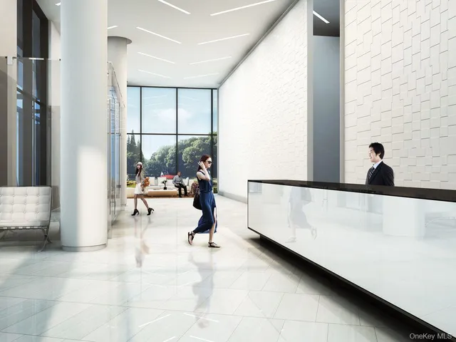 a view of living room with furniture and floor to ceiling window