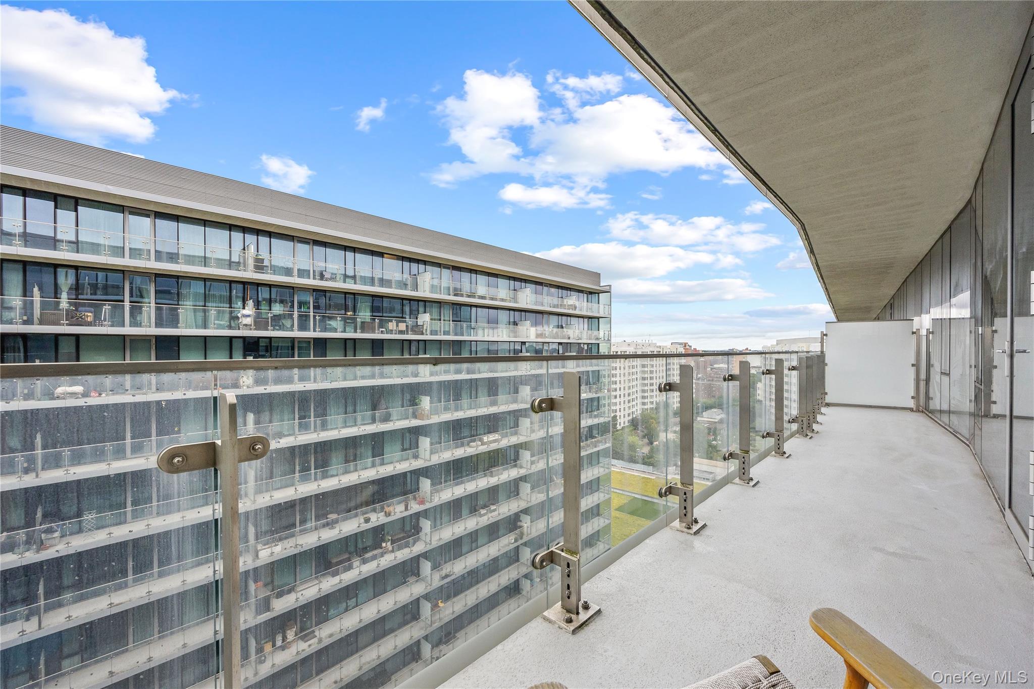 131-01 40 Road, Unit PH3F Queens, NY 11354 - Photo 30 of 30 a view of a living room area with furniture