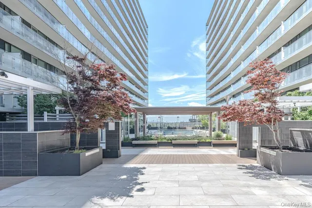 a view of a building with a tree