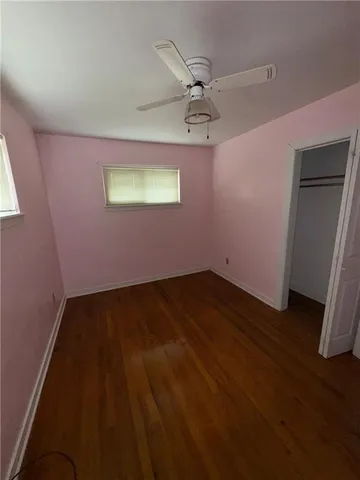a view of a livingroom with wooden floor