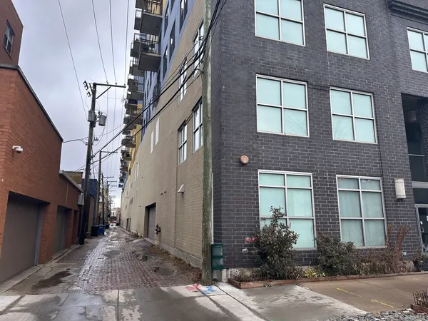 a view of a building with a yard