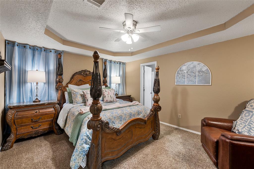 4617 Lexington Street Waco, TX 76705 - Photo 9 of 14 Tray ceiling with overhead ceiling fan and recessed lighting