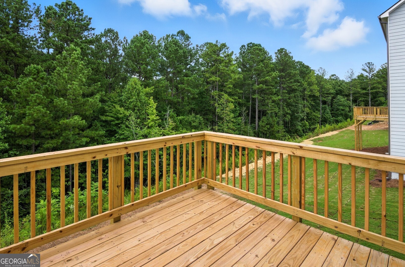 720 River Run Drive, Unit 45 Dallas, GA 30132 - Photo 20 of 53 a view of balcony with wooden floor and fence