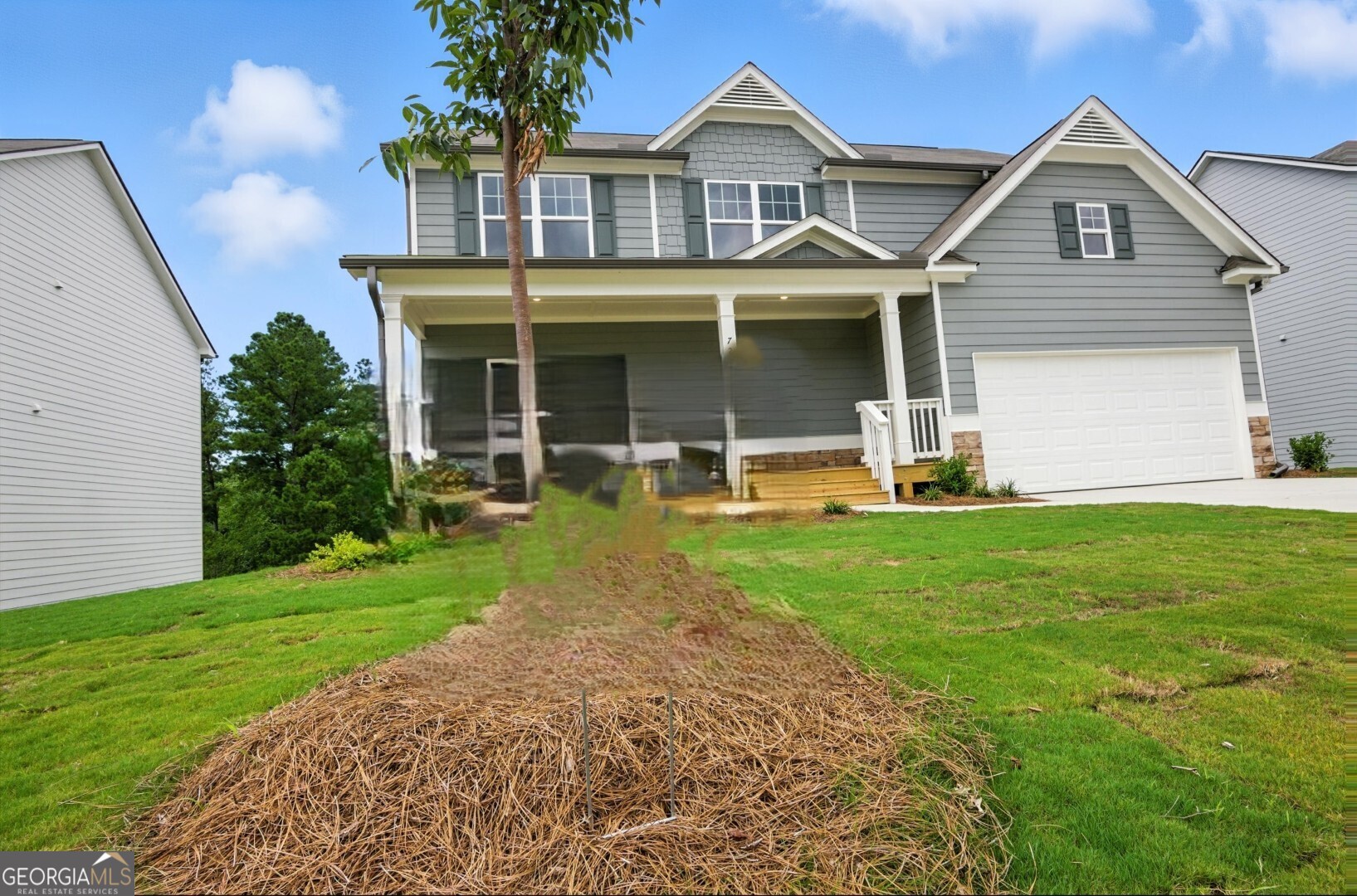 720 River Run Drive, Unit 45 Dallas, GA 30132 - Photo 2 of 53 a front view of a house with a yard and porch