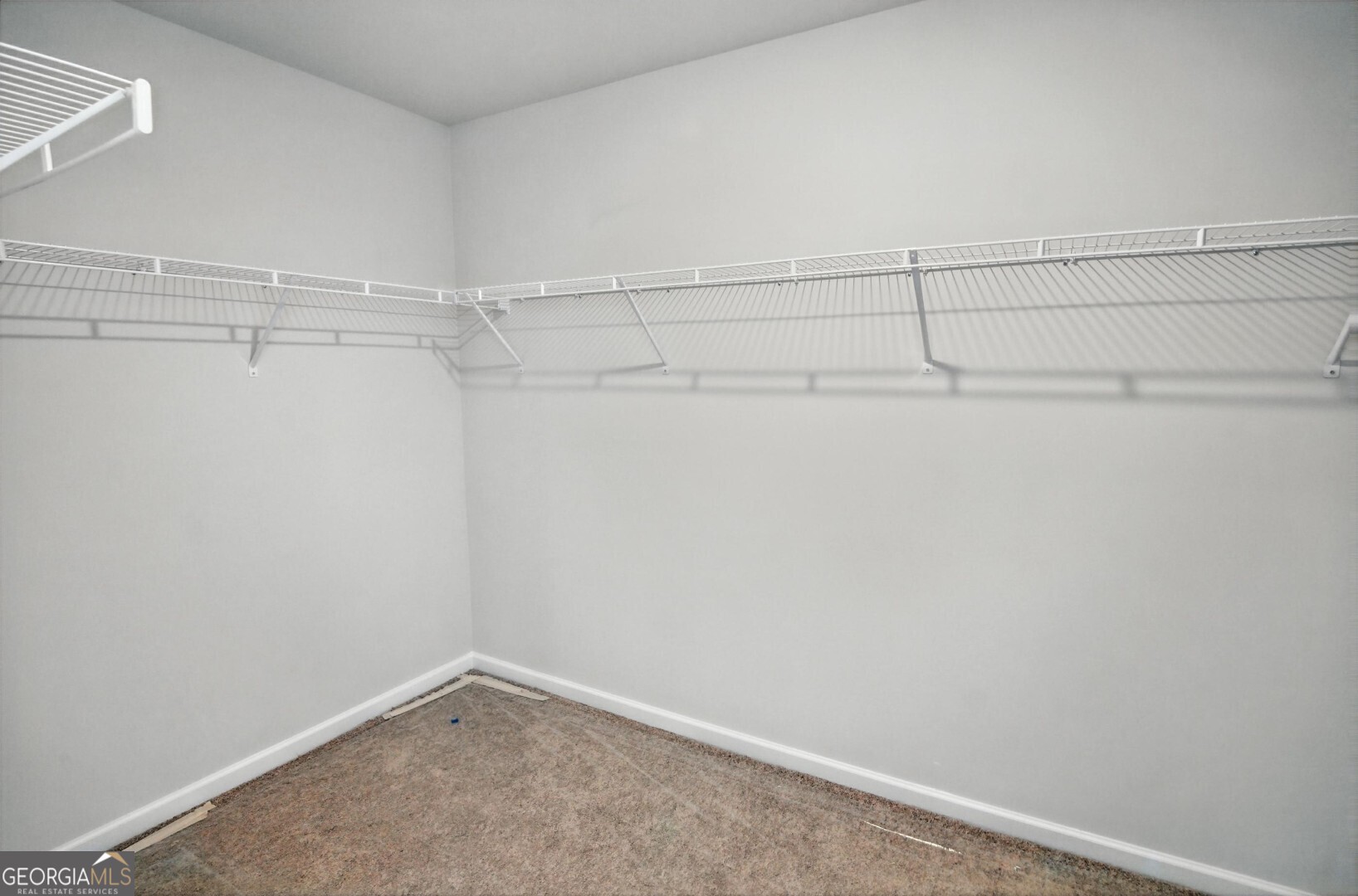 720 River Run Drive, Unit 45 Dallas, GA 30132 - Photo 38 of 53 a view of a room with racks on the wall