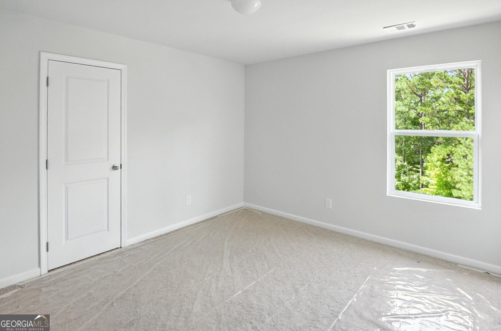 720 River Run Drive, Unit 45 Dallas, GA 30132 - Photo 41 of 53 an empty room with a window