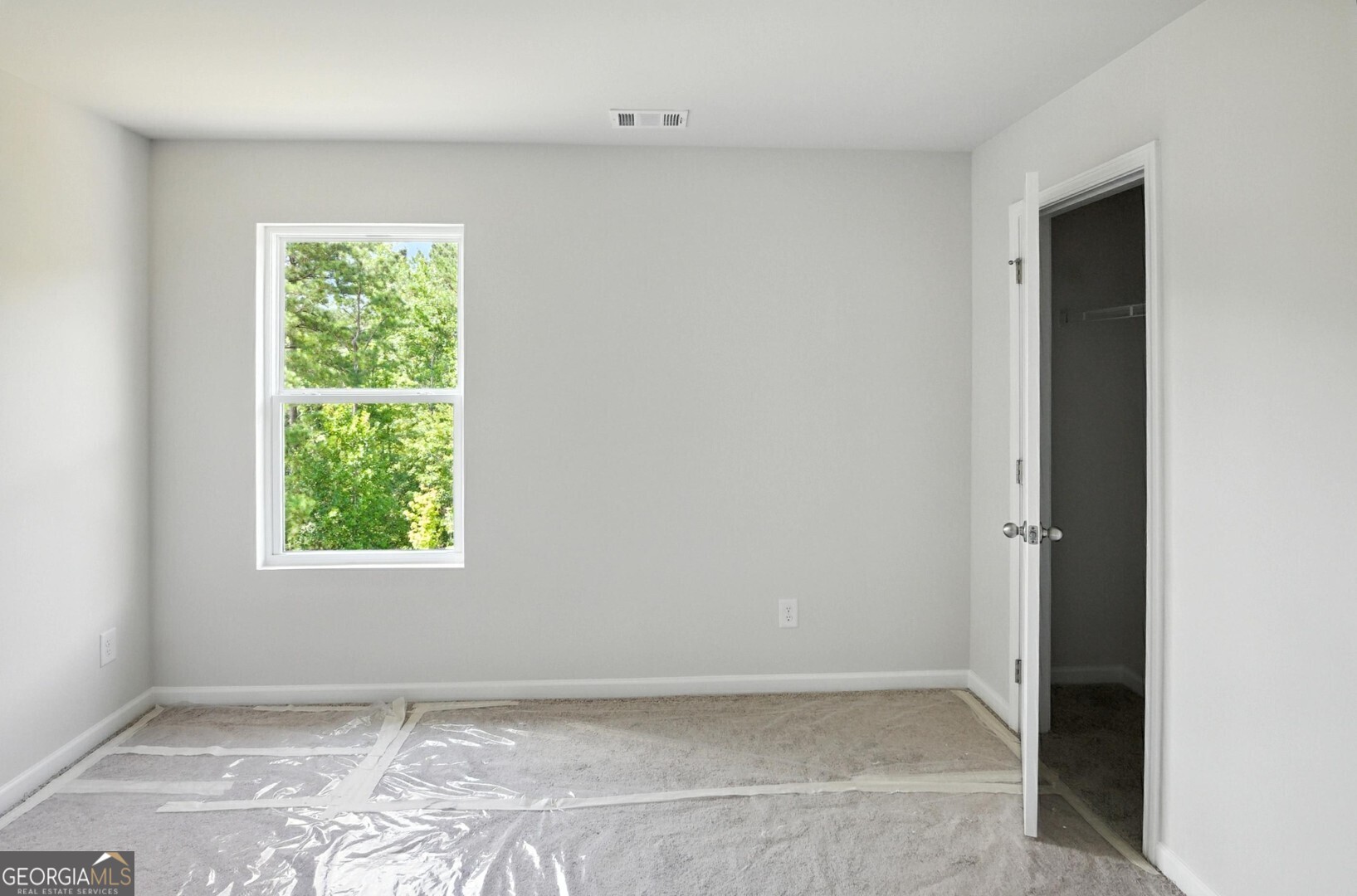 720 River Run Drive, Unit 45 Dallas, GA 30132 - Photo 46 of 53 an empty room with window