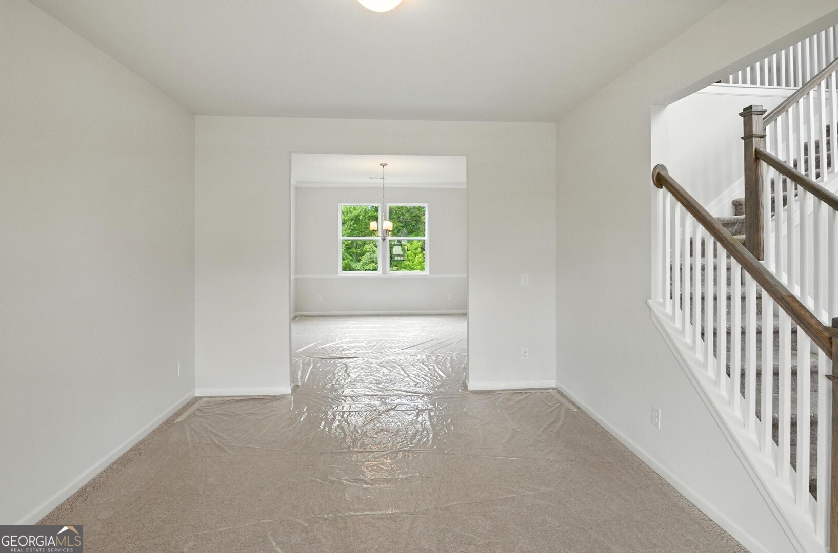720 River Run Drive, Unit 45 Dallas, GA 30132 - Photo 5 of 53 a view of an empty room with stairs