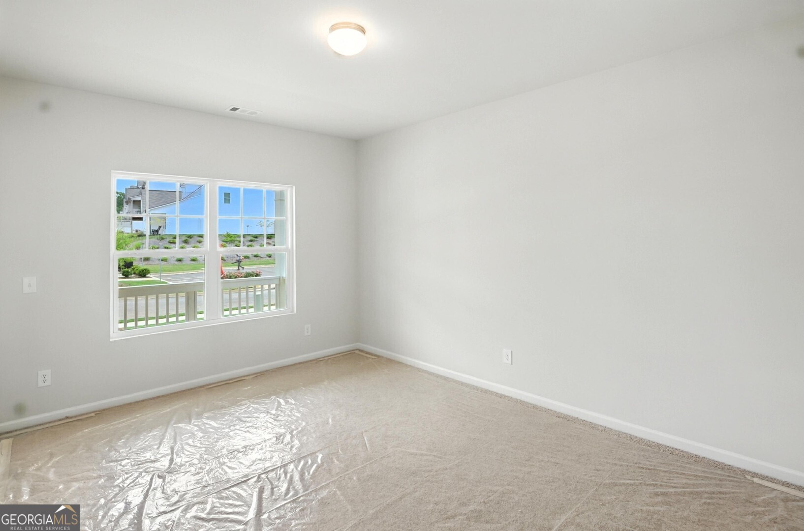 720 River Run Drive, Unit 45 Dallas, GA 30132 - Photo 6 of 53 an empty room with a window