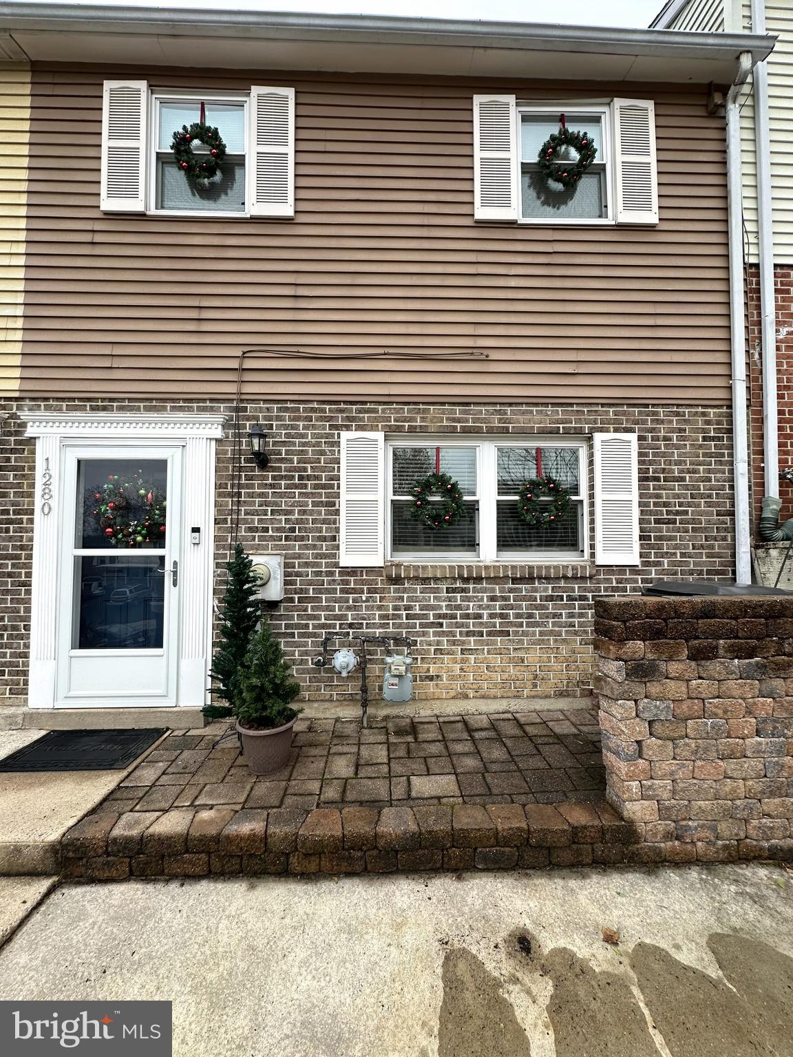 1280 Fox Run Reading, PA 19606 - Photo 1 of 18 a view of a brick house with a large windows