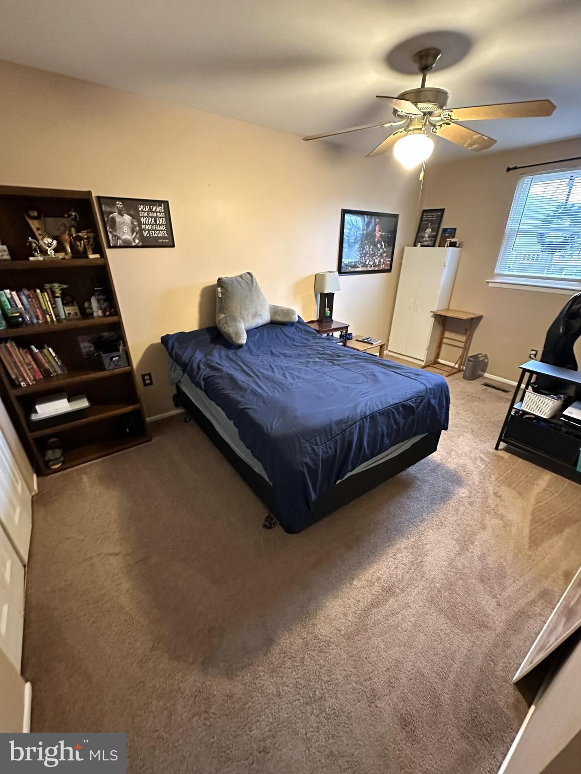 1280 Fox Run Reading, PA 19606 - Photo 15 of 18 a bedroom with a bed and a chandelier