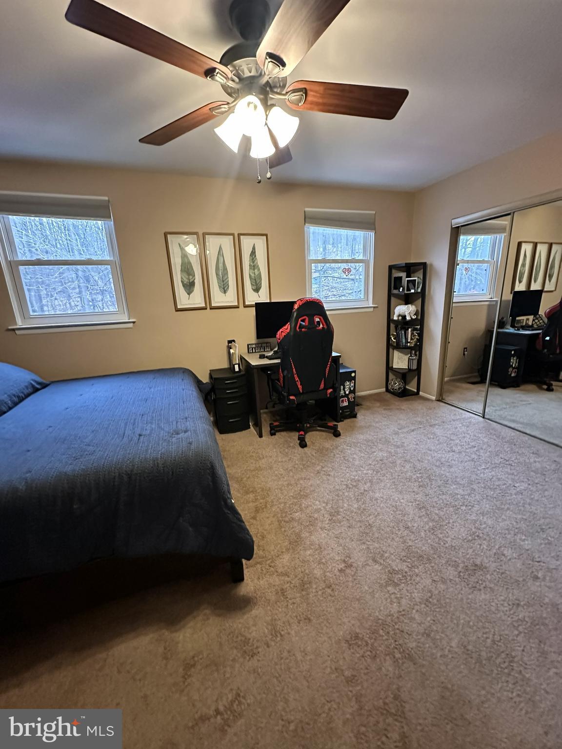 1280 Fox Run Reading, PA 19606 - Photo 17 of 18 a bedroom with a bed and a chandelier