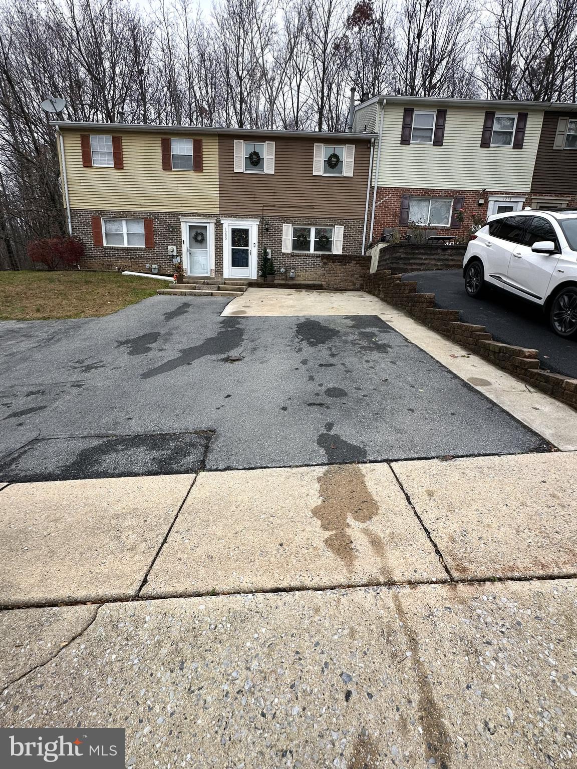 1280 Fox Run Reading, PA 19606 - Photo 2 of 18 a front view of a house with a yard
