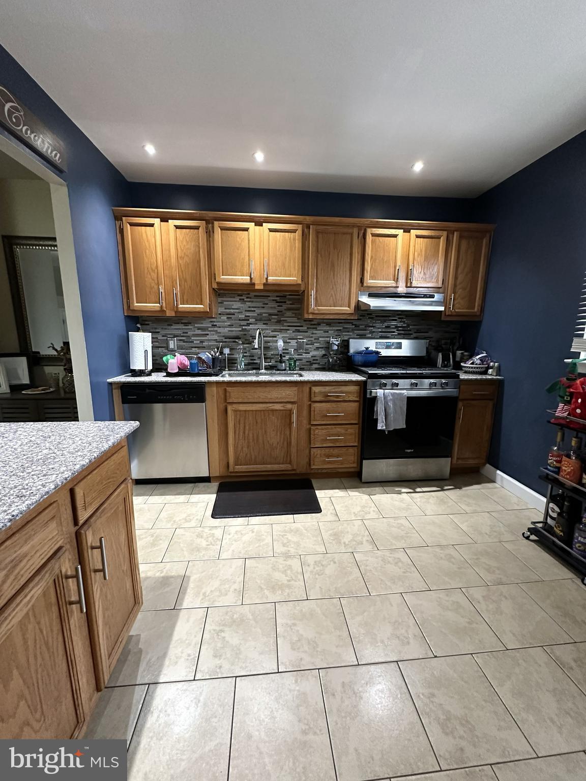 1280 Fox Run Reading, PA 19606 - Photo 8 of 18 a kitchen with stainless steel appliances granite countertop a stove a sink and a microwave