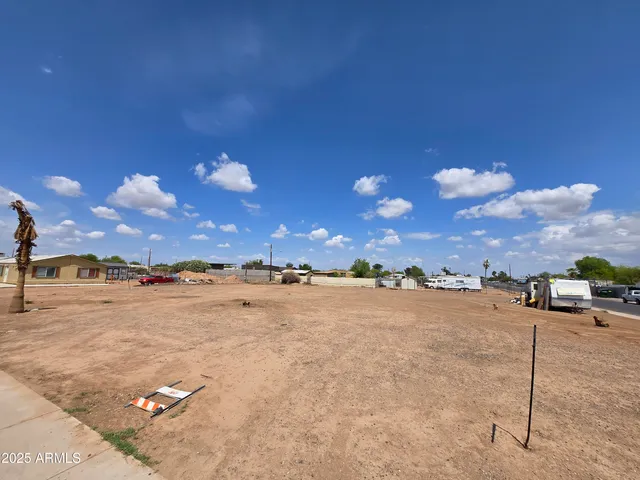 a view of a lake and a yard