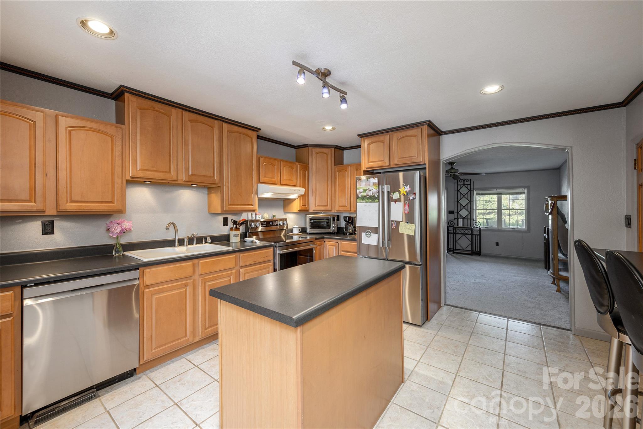 231 Allen Road East Flat Rock, NC 28726 - Photo 7 of 42 a kitchen with cabinets a sink and appliances